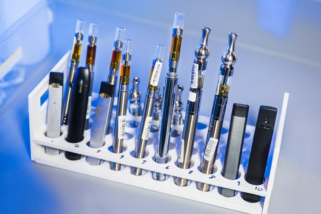 Examples of electronic cigarettes and vaping devices in a laboratory rack